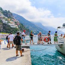 a group of people on a boat in the water