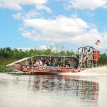 a group of people riding a boat on the water