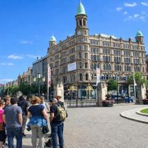 a group of people standing in front of a building