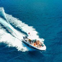 a boat with people on it in the water