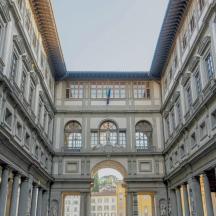 a large building with an archway in a building