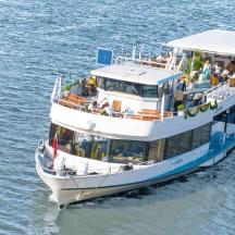 a boat in the water with people on it