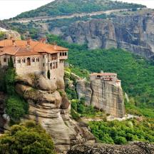 a castle on the side of a cliff