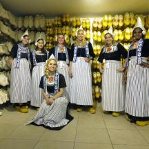 a group of women posing for a picture in a store