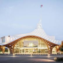 a large building with a wooden roof