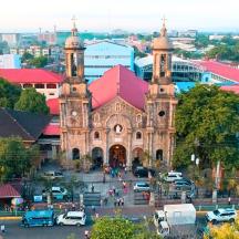 an old church in the middle of a city