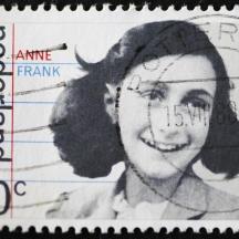 a drawing of a woman on a postage stamp