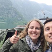 a man and a woman giving a thumbs up