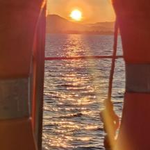a view of the sunset from a boat