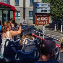 a group of people sitting on a bus