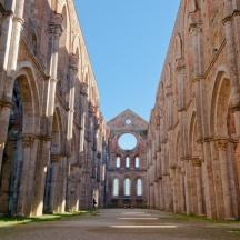 a large building with an archway in the middle