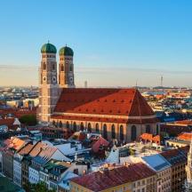 an aerial view of a city with a clock tower