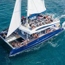 a group of people on a boat in the water