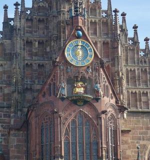 a building with a clock on the front of it
