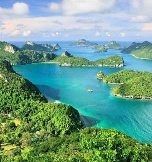 an aerial view of a group of islands in the ocean