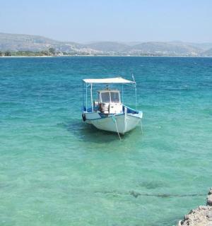 two boats are docked in a large body of water