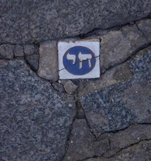 a sign on the ground on the street