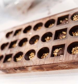 a metal container filled with bees