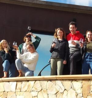 a group of people are posing for a picture