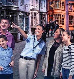 a group of people standing on a city street