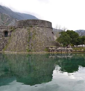 a wall in the middle of a body of water