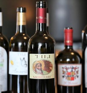 a group of wine bottles sitting on a table
