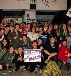 a group of people posing for a picture with signs