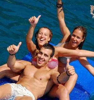 a group of people laying in the water
