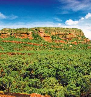 a large rock formation on top of a mountain
