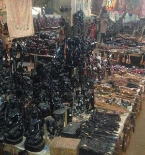 a store filled with lots of shoes and weapons