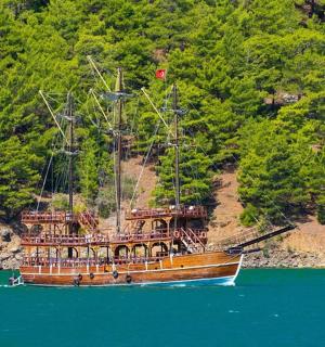 a large boat in the middle of a body of water