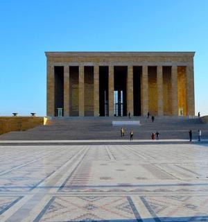 a view of a large building with a pyramid