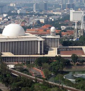 a large building with a white dome on top of it