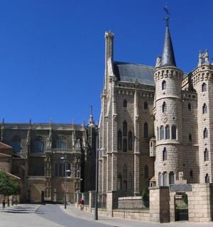 a large stone building with a tower on top