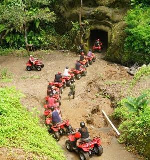 a group of people riding motorcycles in a tunnel