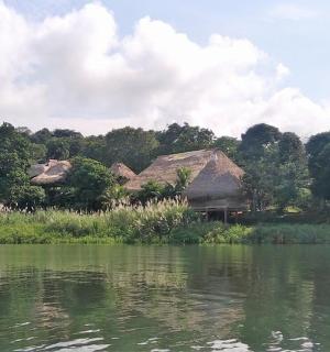 a house on the shore of a body of water