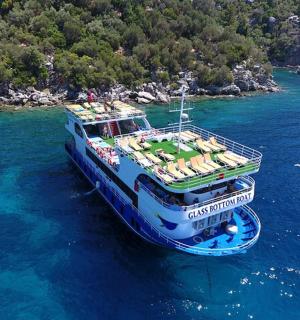 a boat with people on it in the water