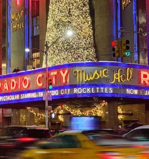 a neon sign for the radio city music hall