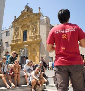 a man standing in front of a crowd of people
