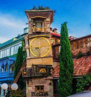 a clock tower on the side of a building