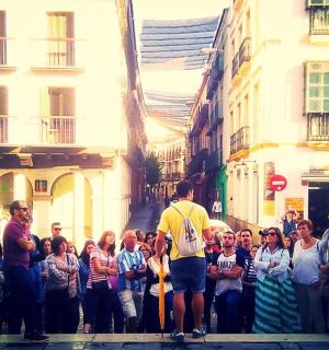 a man standing in front of a crowd of people