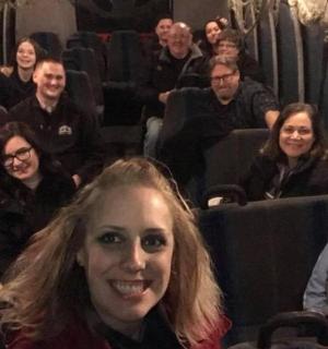 a group of people sitting on a bus