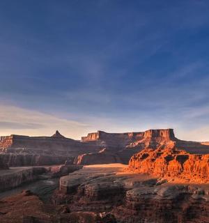 a view of the grand canyon at sunset