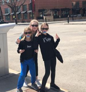 a man and two women posing for a picture