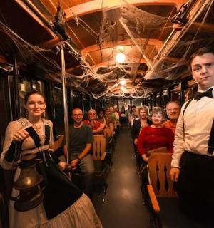 a group of people sitting in a bus