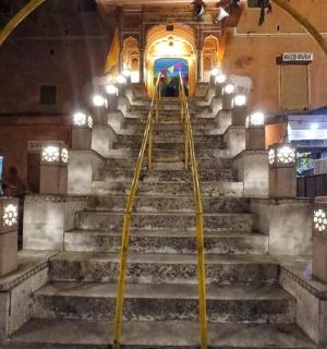 a set of stairs in a building with lights