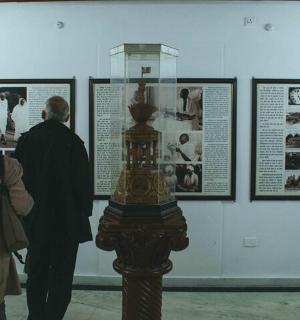two people looking at a display in a museum