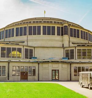 a building with a van parked in front of it