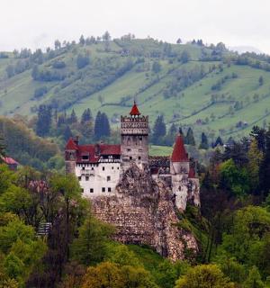 a castle sitting on top of a mountain
