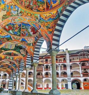 a large building with a painting on the wall